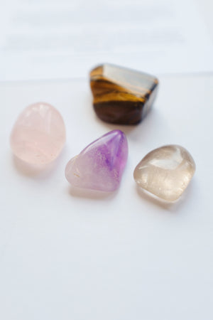 Packet of crystals for bereavement, including various healing stones designed to provide comfort and support during times of loss.