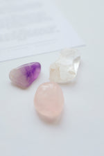 Packet of crystals for car protection, including stones believed to provide safety and protection during travel.