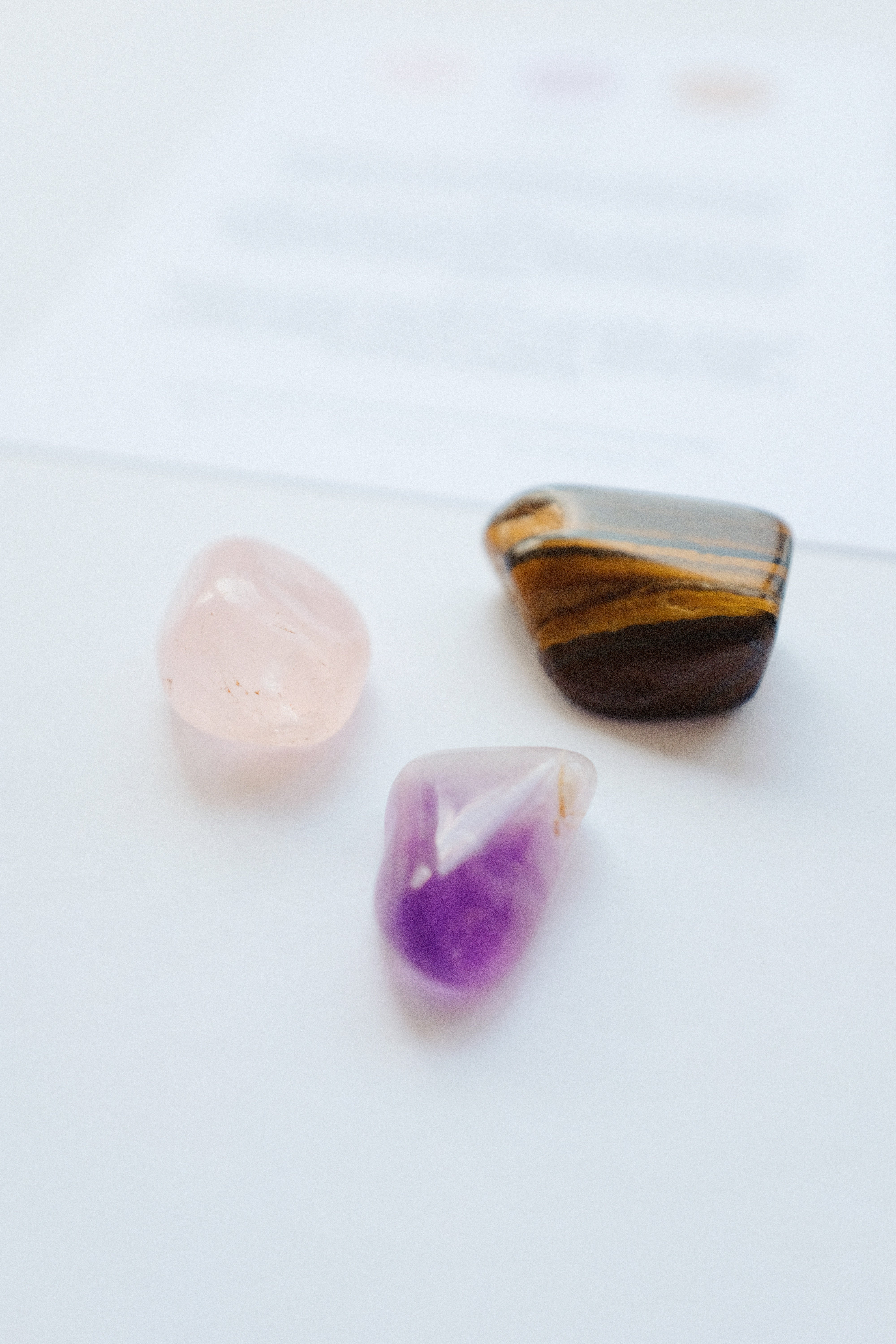 Packet of crystals for stress relief, containing a variety of calming stones to help alleviate anxiety and promote relaxation.